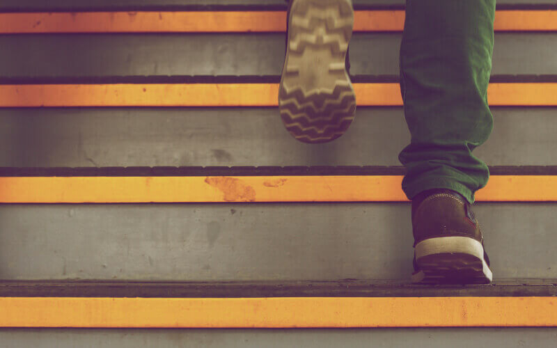 Feet climbing stairs